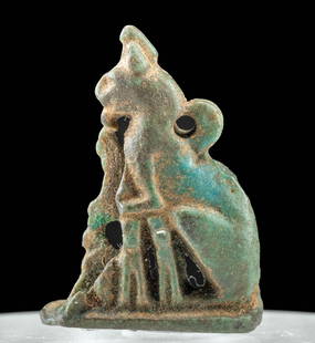 Rare Egyptian Faience Amulet Mother Cat + 6 Kittens: Ancient Egypt, Third Intermediate to Late Dynastic Period, 21st to 31st Dynasty, ca. 1070 to 332 BCE. A mold-formed and turquoise-glazed faience amulet depicting a seated mother cat with her 6 kittens