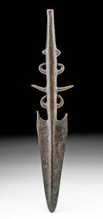 Ancient Indian Gangetic Copper Culture Spear Tip: Central Asia, India, Gangetic Basin, Copper Hoard Culture, ca. 1000 BCE. A sizable copper spear tip bearing a thick body with protruding spines and tendrils, a tapered tip for hafting to a longer pole