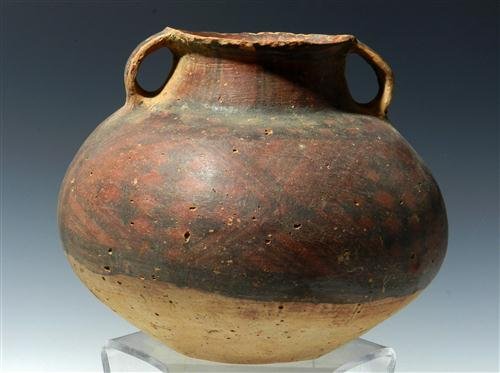 A Chinese Neolithic Painted Pottery 2-Handled Jar: Unusual twin-handled pottery jar was made over 4,000 years ago during the Machang Phase (ca. 2300 - 2000 BC) of the Majiayao culture, also known as the Gansu-Yangshao culture, from present day Gansu o