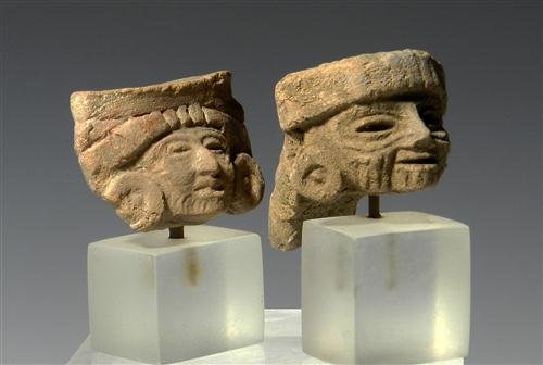 Another Pair of Pre-Columbian Pottery Heads: From central Mexico, Post Classic, Ca 1000 to 1300 AD. Each head very expressive, one with remains of original pigment. Largest 1-1/2" long. Custom mounted. Provenance: Ex-Brian Saldano Collection Thi