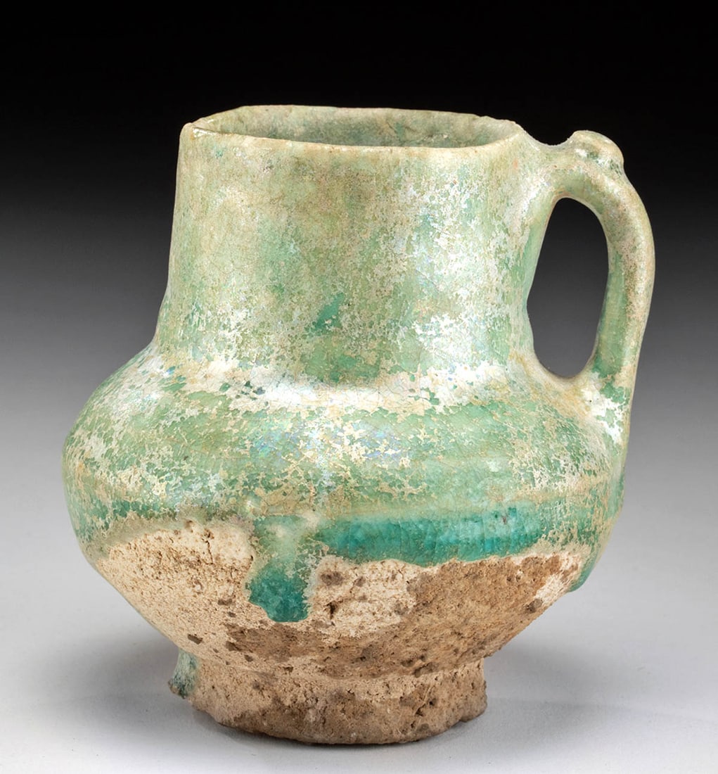 10th C. Nishapur Islamic Glazed Pottery Vessel: **Originally Listed At $300** Medieval Near East / Western Asia, Persia (Iran), Nishapur area, Islamic culture, ca. late 10th to early 13th century CE. A hand-built pottery mug with iridescent blue-gr