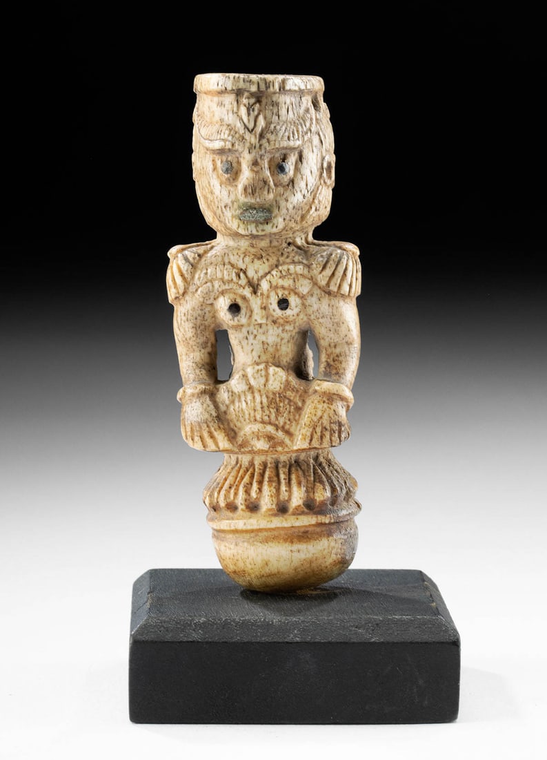 19th C. Indonesian Carved Ox Bone Kris Handle: **Originally Listed At $300** Southeast Asia, Indonesia, ca. 19th century CE. A hand-carved ox bone handle meant to adorn the tang of a kris dagger. The handle features the top half of an abstract fig