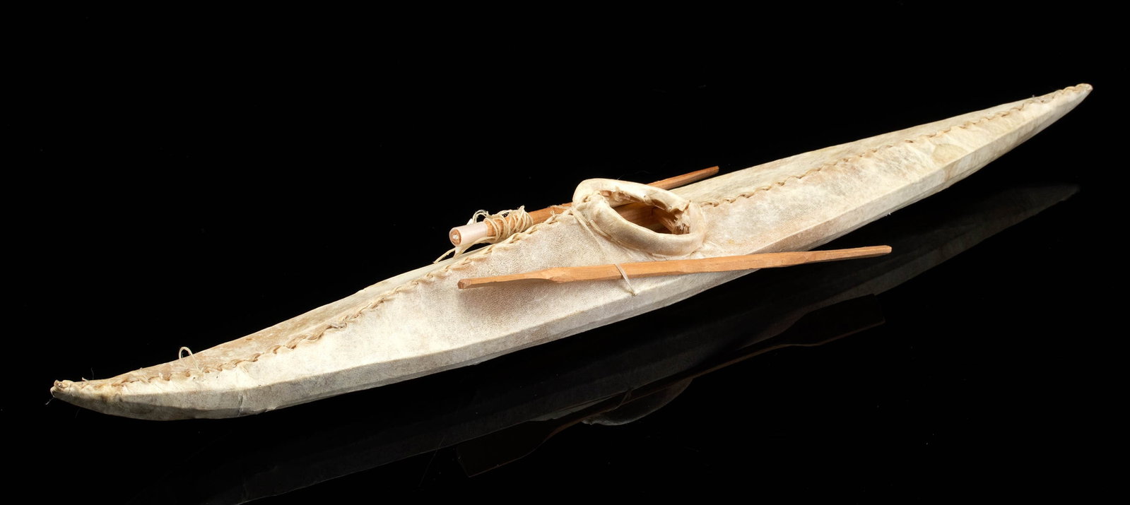 Miniature Inuit Sealskin Kayak Boat & Harpoon Model: **Originally Listed At $200** Native American, Northwestern United States or Canada, Inuit / Aleut people, ca. mid-20th to 21st century CE. A superb miniature model kayak boat made from stretched seal