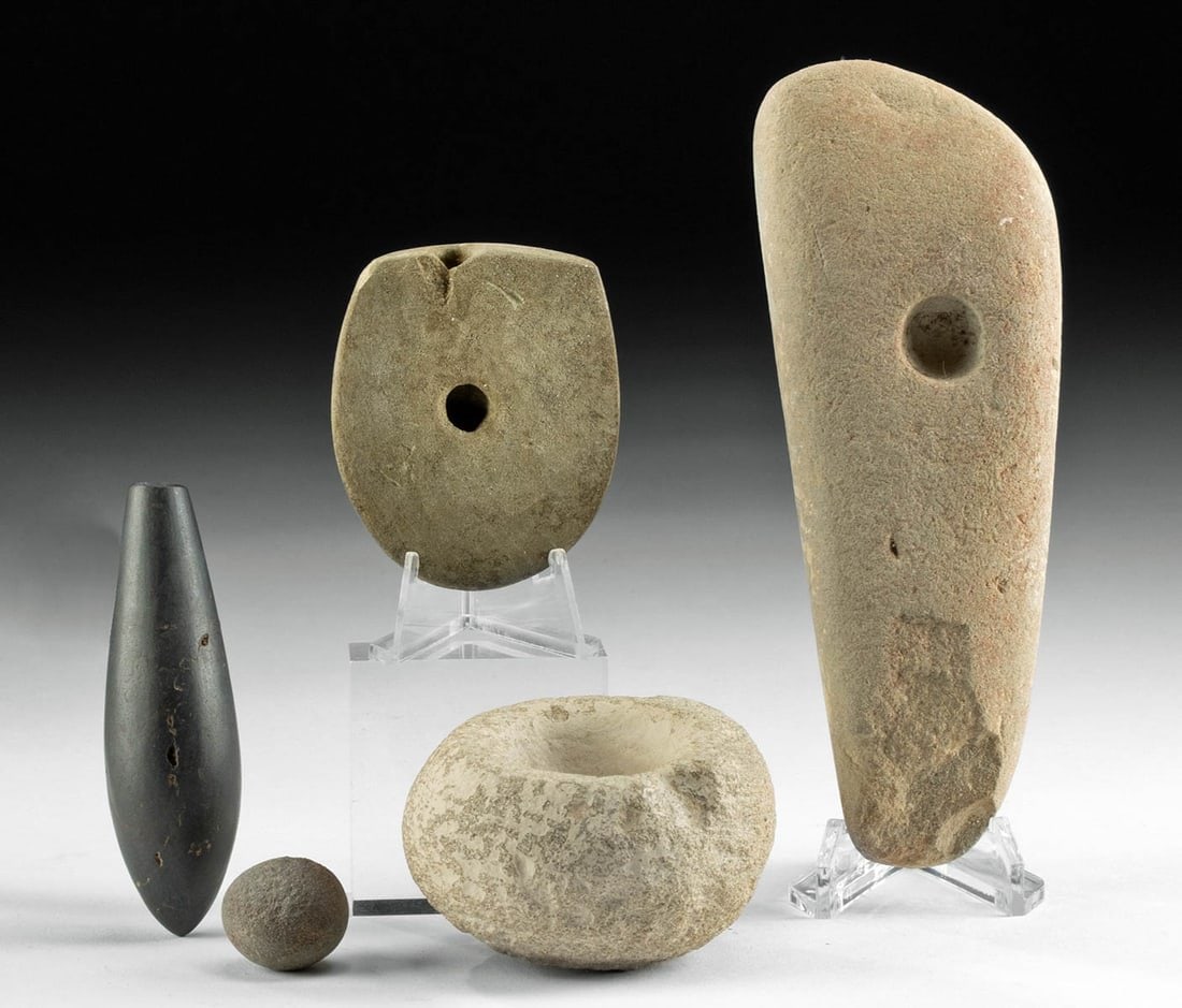 5 Native American Eastern Woodland Worked Stone Tools: **Originally Listed At $400** Native American, Eastern United States, Woodland period, ca. 200 to 1000 CE. A collection of 5 stone tools and artifacts: a grinding mortar, spherical pebble, a preform g