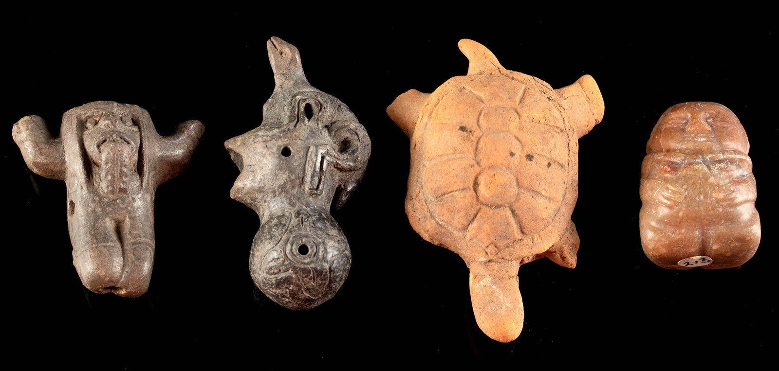 Pre-Columbian Pottery Artifacts- Turtle + 3 Ocarinas: Pre-Columbian, West Mexico, Colima, ca. 300 BCE to 300 CE; Maya territories, ca. 500 to 950 CE; Costa Rica, ca. 800 to 1200 CE. A charming ensemble of 4 pre-Columbian artifacts: a terracotta turtle fr