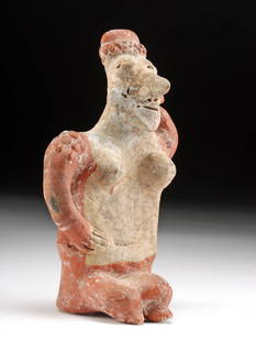 Jalisco Sheepface Female Figure: **Originally Listed At $400** Pre-Columbian, West Mexico, Jalisco, ca. 300 BCE to 300 CE. A fine pottery figure of a female in a seductive pose that highlights her voluptuous curves and displaying a c