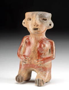 Jalisco Zacatecas Pottery Seated Female Figure: **Originally Listed At $350** Pre-Columbian, West Mexico, Jalisco, Zacatecas culture, Early Classic Period, ca. 250 to 450 CE. A hand-built pottery figure depicting a female figure seated on thick leg