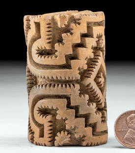 Large Pre-Columbian Ecuadorian Roller Stamp: Pre-Columbian, Ecuador, La Tolita (Tumaco) to Manteno culture, ca. 600 BCE to 15th century CE. A pottery cylinder roller stamp both with geometric motifs or glyphs around the face and a perforation