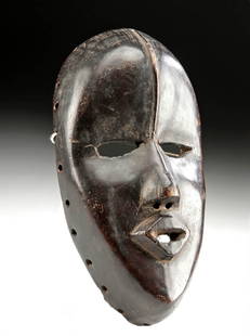 African Dan Ceremonial Mask (Gle), ex-Peter Arnovick: West Africa, Liberia and Ivory Coast, Dan peoples, ca. early to mid-20th century CE. A hand-carved wooden face mask known as a "gle" or "ge" used during ceremonial dances by the Dan peoples. The