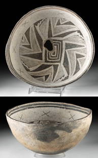 Prehistoric Mimbres Black on White Bowl Kill Hole: Native American, Southwestern United States, New Mexico, Mimbres Valley, Mimbres, ca. 1025 to 1250 CE. An attractive pottery bowl of hemispherical form with a deep interior basin adorned with