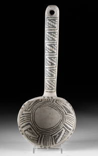 Choice Prehistoric Anasazi Black on White Pottery Ladle: Native American, Southwestern United States, Mesa Verde region, Anasazi (Ancestral Puebloan), ca. 900 to 1300 CE. A hand-built white-ground pottery ladle of sizable form. The handle and scoop are