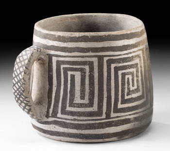 Prehistoric Anasazi Pottery Mug, Mesa Verde Region: Native American, Southwestern United States, Mesa Verde region, Anasazi (Ancestral Puebloan), ca. 1100 to 1300 CE. A lovely white-ground pottery mug, formed via the coil-and-scrape technique, of