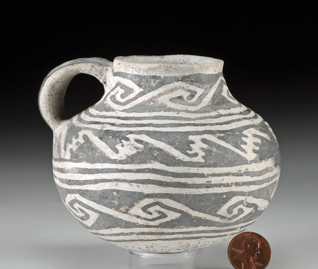 Miniature Prehistoric Anasazi Tularosa Pottery Juglet: Native American, southwestern United States, New Mexico, Ancestral Puebloan (Anasazi) period, Tularosa, ca. 900 to 1450 CE. A white-ground pottery jar of stout form with a round but stable base and a 