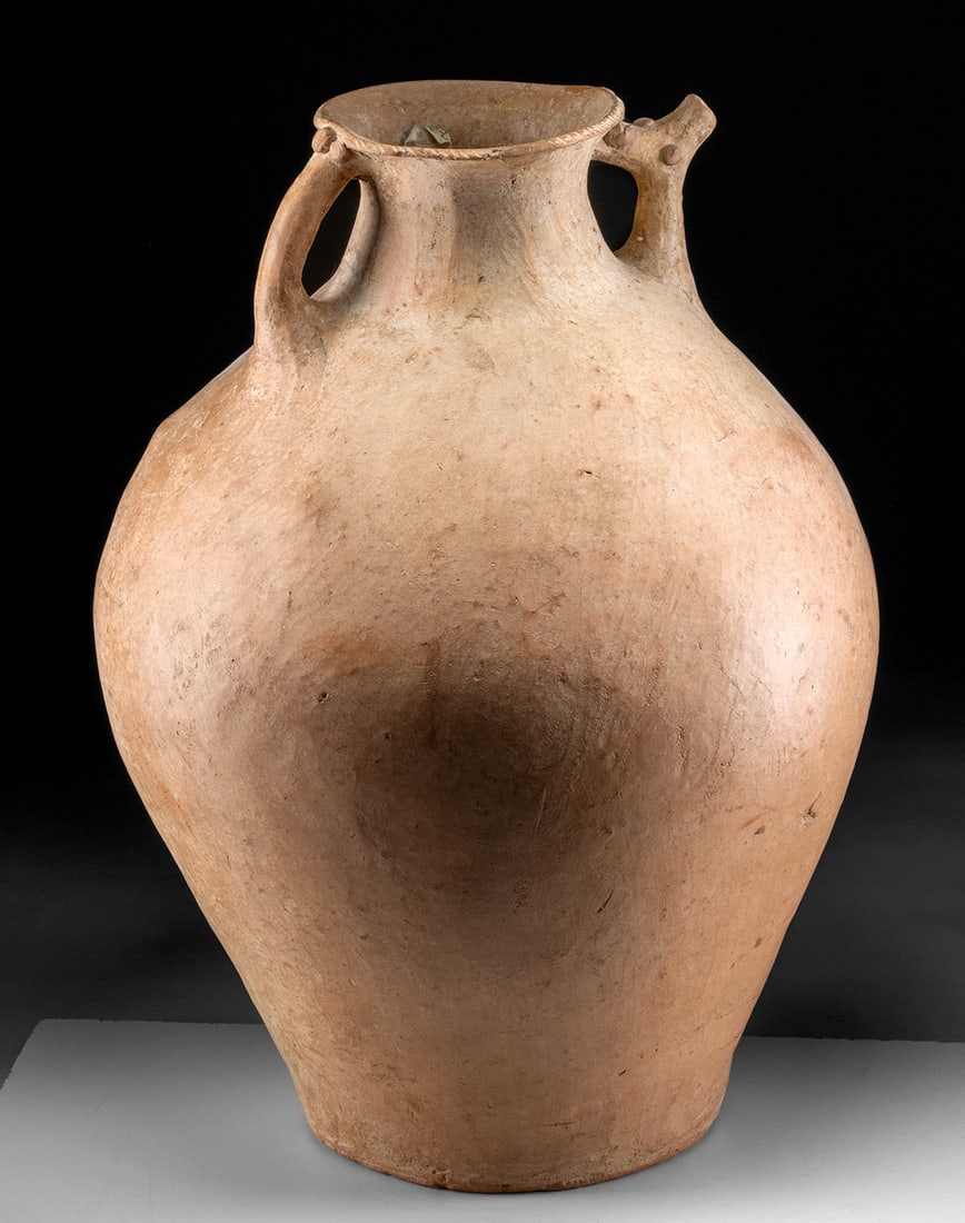 Huge Persian / Azerbaijan Wine Jar Cow Spout, TL'd: **Originally Listed At $3000** Ancient Central Asia, Persia / Azerbaijan, Bronze Age, ca. 2000 BCE. An imposing pottery wine jar of unique form and impressive scale featuring a spout in the shape of a