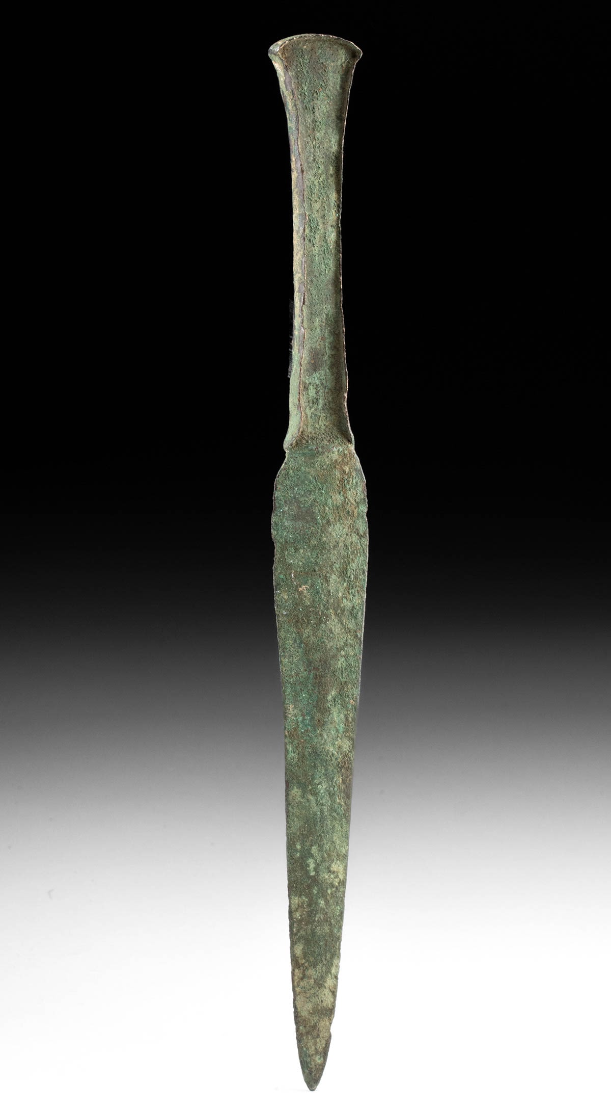 Ancient Luristan / Amlash Bronze Dagger: Ancient Near East, Northern Iran and Southeastern Turkey, Luristan / Amlash, Iron Age, ca. 11th to 7th century BCE. A cast bronze dagger, the blade and handle are a single piece. The handle would have