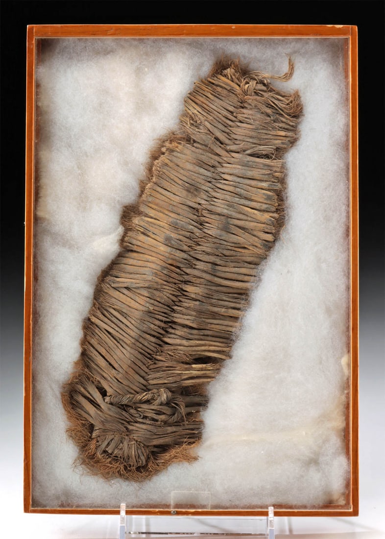 Prehistoric Anasazi Woven Yucca Sandal Sole: Native American, Southwestern United States, Anasazi (Ancestral Puebloan), ca. 500 to 1300 CE. A rare and relatively well preserved single ancient sandal sole woven from yucca plant fronds! Yucca leav