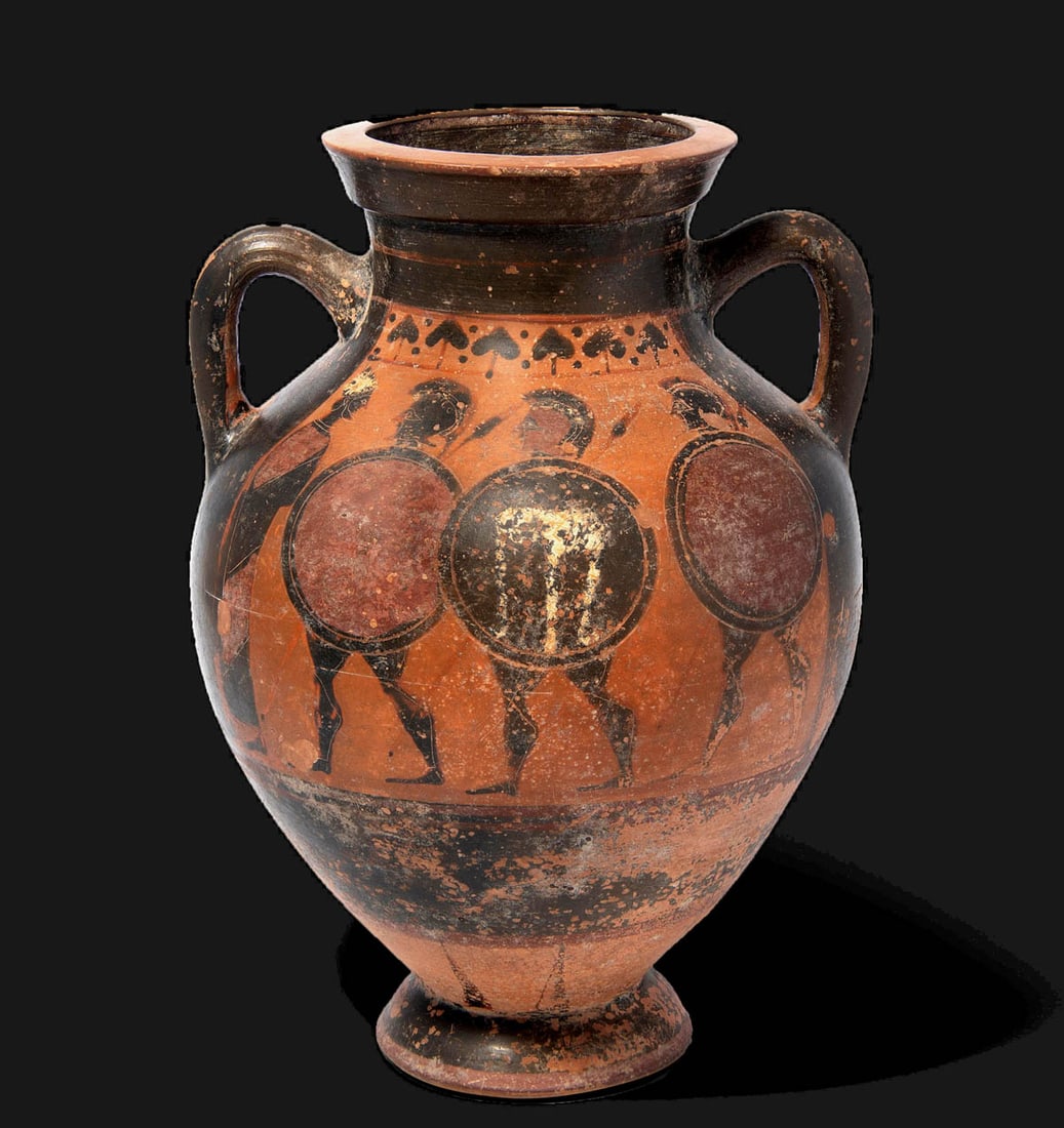Attic Black-Figure Amphora Warrior Farewell Scene: Greece, Athens (Attic), ca. 580 to 550 BCE. An opulent black-figure amphora featuring an ovoid body, a flared rim, and vertical, arched handles, all sitting upon an annular foot. The exterior is adorn