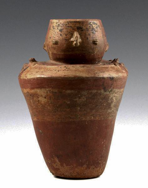 A Pre-Columbian Middle Cauca Effigy Vase, Colombia: A finely rendered example of a relatively rare type of effigy vessel from the Pre-Columbian Middle Cauca Complex of ancient Colombia, circa 1000 A.D. – 1500 A.D. This bi-chrome vessel displays impre