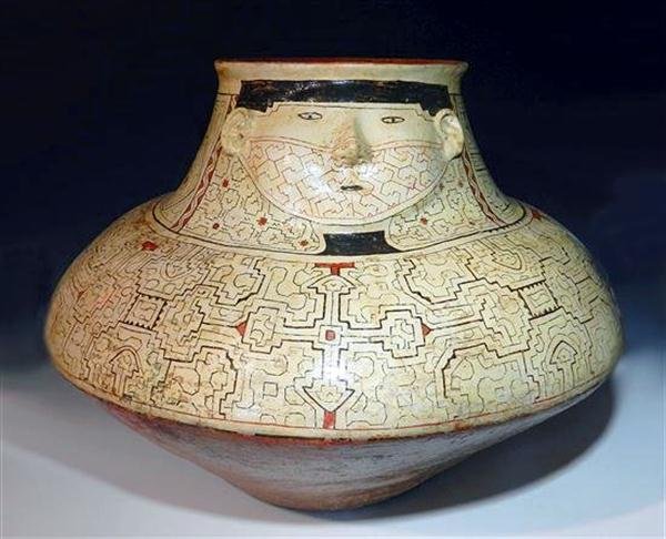 A Massive Shipibo Pottery Olla: From the Shipibo Tribe of eastern Peru, at the headwaters of the Amazon, ca 1950. This incredible olla is the type used by the natives to handle their cooking and probably has its roots in the vessels