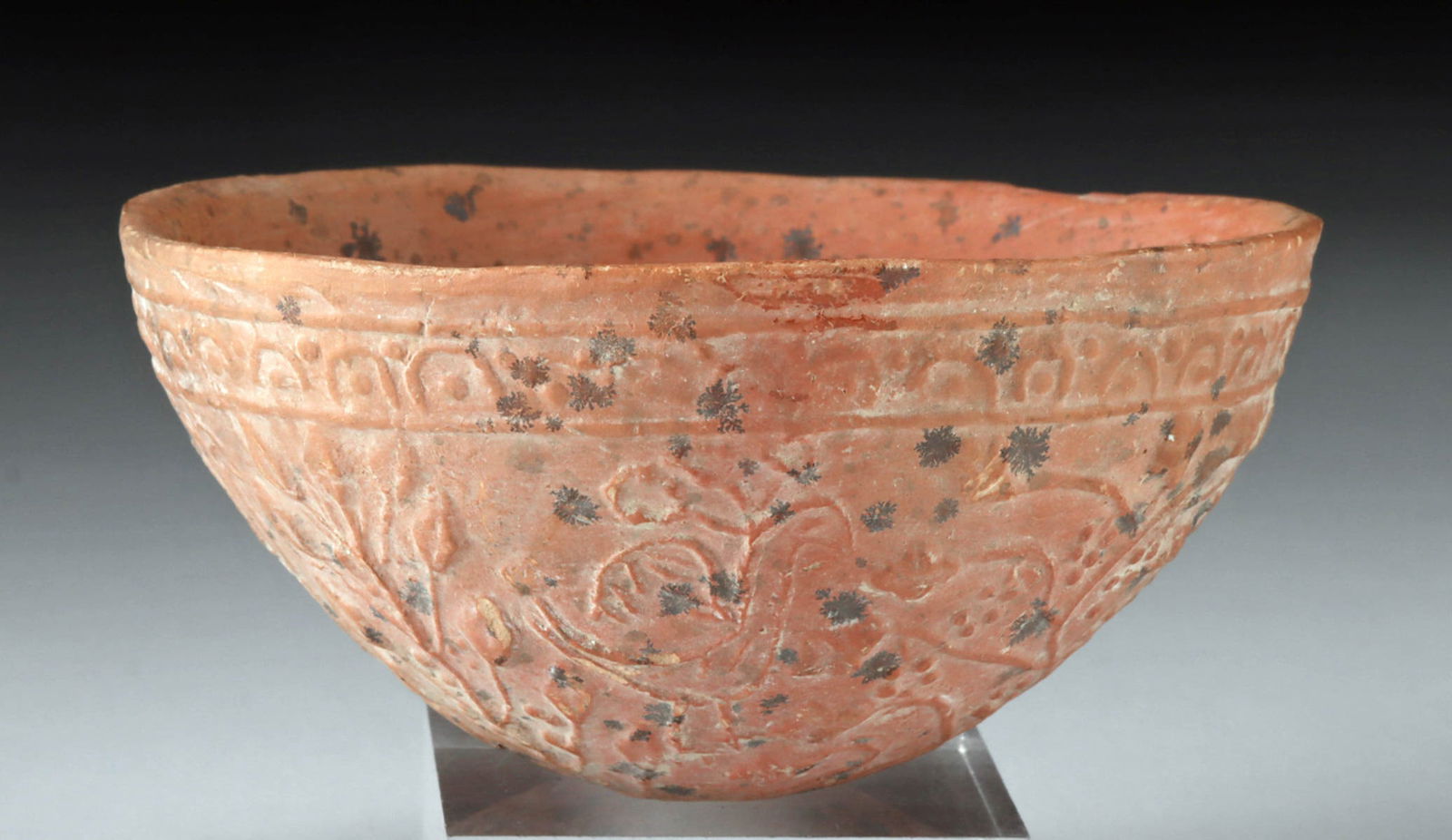 9th C. Islamic Abbasid Redware Bowl Mold w/ Peacocks: Near East, Abbasid Empire, Islamic culture, ca. 9th to 13th century CE. A beautiful and fascinating pottery mold used to decorate the interior surfaces of other bowls. Hemispherical in form, the imple