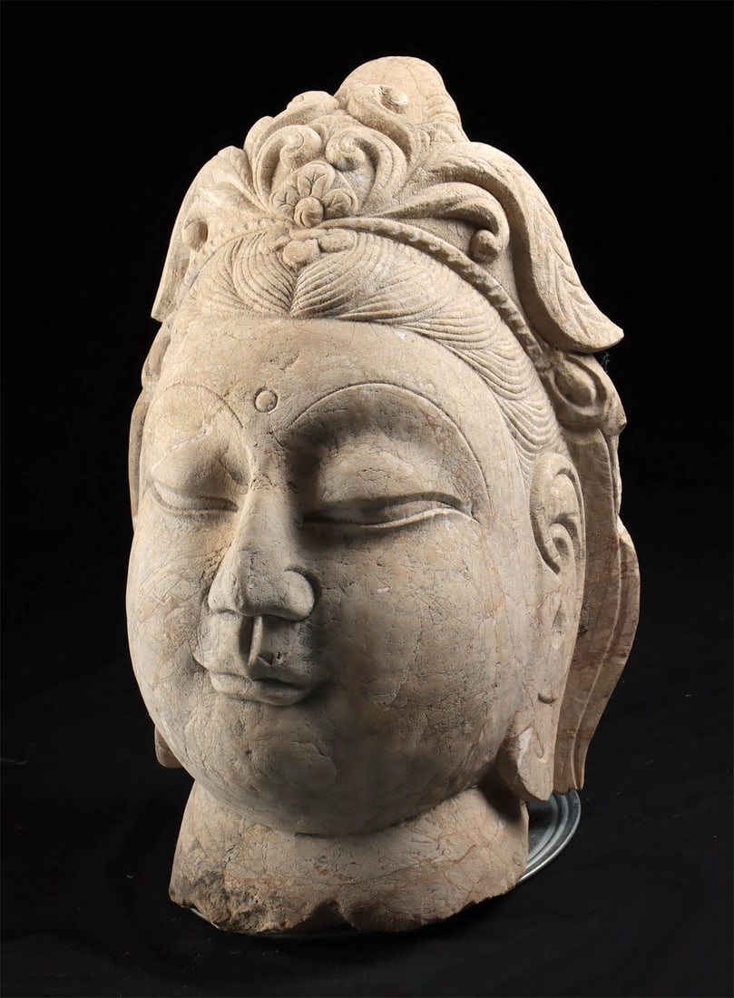Lifesize+ Chinese Ming Dynasty Limestone Head of Guanyin: East Asia, China, late Ming to Qing Dynasty, ca. 17th to 19th century CE. A gorgeous, larger than life limestone head of the bodhisattva Guanyin (Avalokiteshvara), "The Lord Who Gazes Down at The Worl