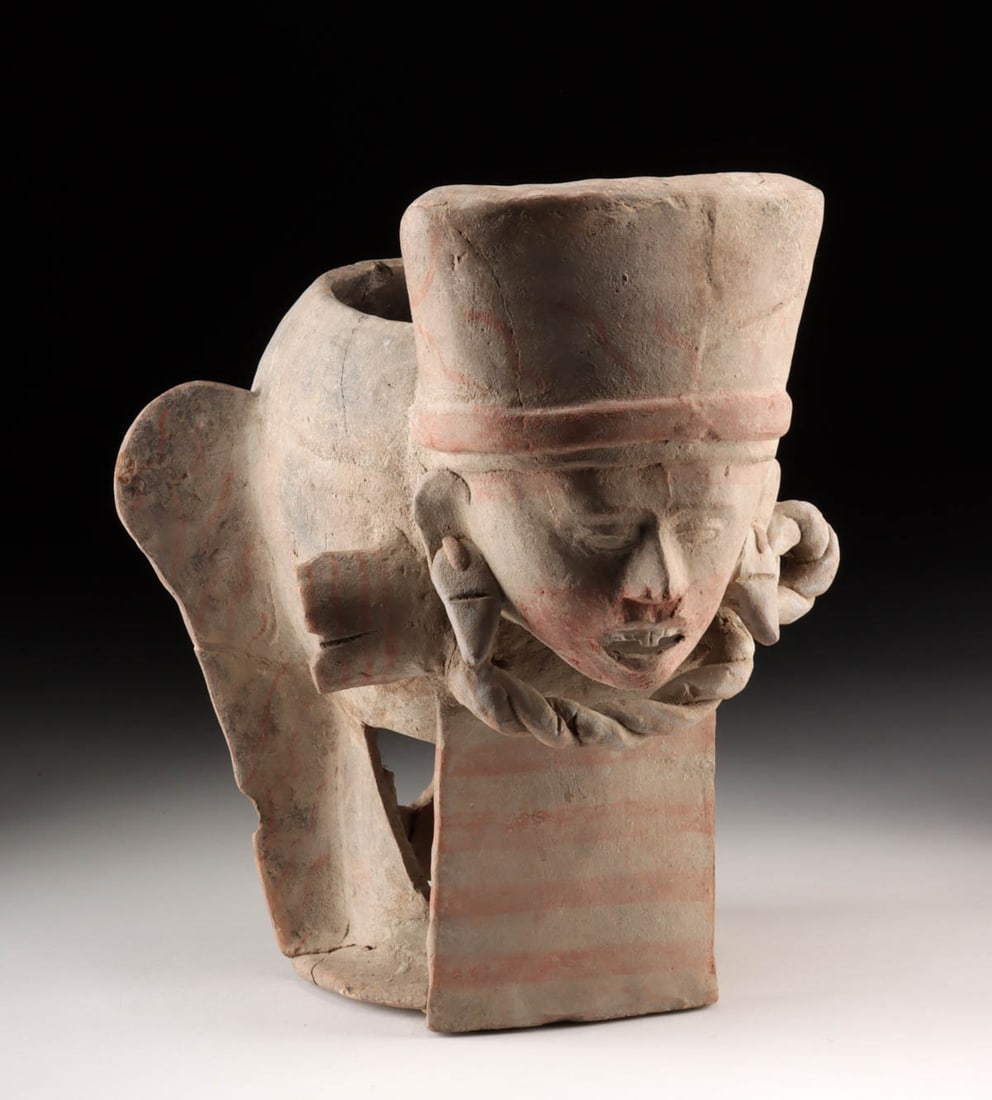 Large Veracruz Figural Incensario (of a Royal / Deity): Pre-Columbian, Mexico, Vera Cruz culture, ca. 6th to 8th century CE. An impressive pottery incensario boasting the bust of a figure, likely a royal or deity, depicted heavily adorned with a corded nec
