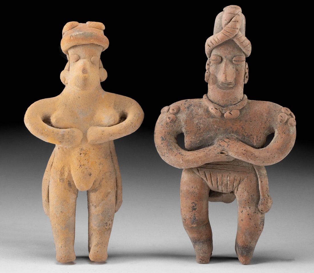 2 Colima Flat Figures - Male & Female: **Originally Listed At $350** Pre-Columbian, West Mexico, Colima, ca. 300 BCE to 300 CE. A set of 2 hand-built pottery figures including a redware man and a light-orange woman. The semi-nude woman pre