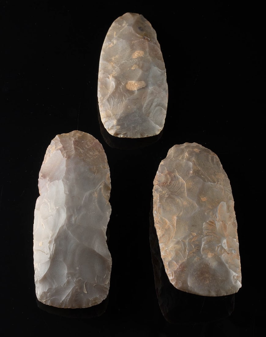 Three Neolithic African Stone Hand Tools: **Originally Listed At $250** Africa, Neolithic Period, ca. 10000 to 5000 BCE. A set of 3 hand-knapped stone hand tools of blade-like forms, perhaps used as hand choppers or blades that were bound to