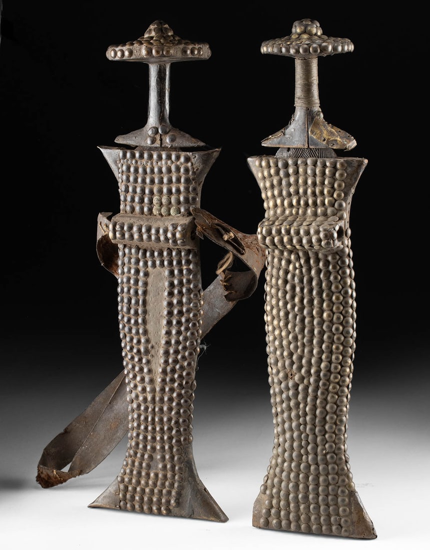 Two African Konda Iron Swords w/ Wood & Brass Sheaths: **Originally Listed At $300** Central Africa, Democratic Republic of the Congo, Mongo peoples, ca. early to mid-20th century CE. A pair of ceremonial knives, or short swords, known as Konda (also Ikak