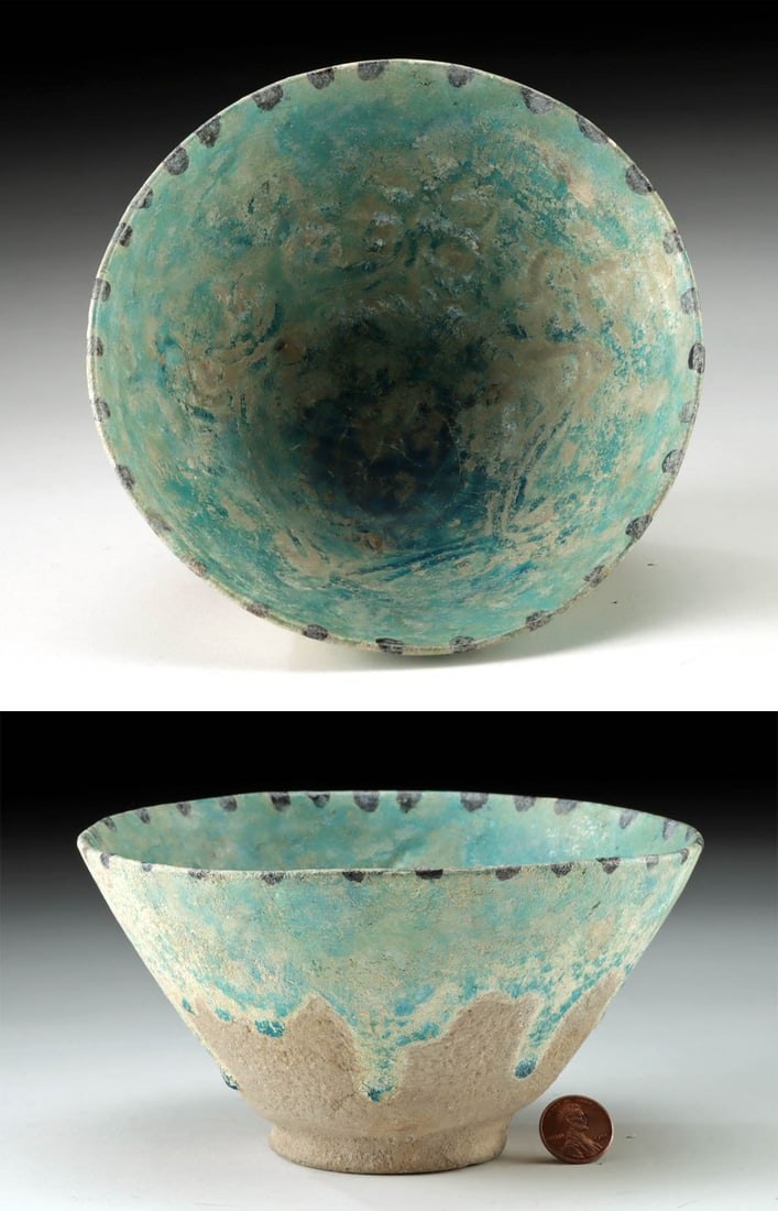 Islamic Nishapur Turquoise Glazed Pottery Bowl: **Originally Listed At $400** Near East, Persia (Iran), Nishapur area, ca. late 10th century to early 13th century CE. A dazzling terracotta bowl boasting a deep basin with a relief floral motif at th