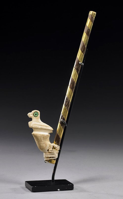 A Moche Atl Atl / Royal Sceptre of Power: Pre-Columbian, Mochica, North Coast Peru, ca. 100-400 CE. Miniature spear thrower sceptre, wood with hgh karat gold band & caps on either end, having a bird finial carved in white seashell with inlaid