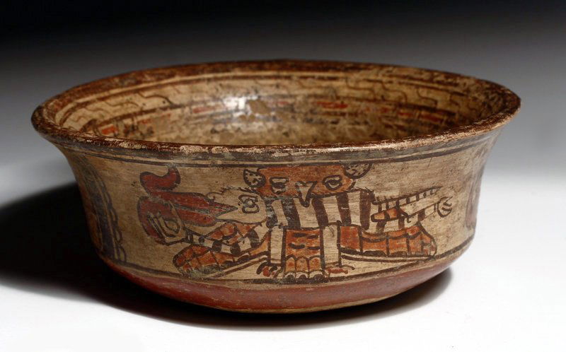 An Amusing Mayan Polychrome Bowl: Most likely from the hands of a child or adolescent! Pre-Columbian, Maya, Honduras or El Salvador, Ca 550 to 900 CE. Terracotta bowl with such fun characters. First, an owl stands wings outstretched h