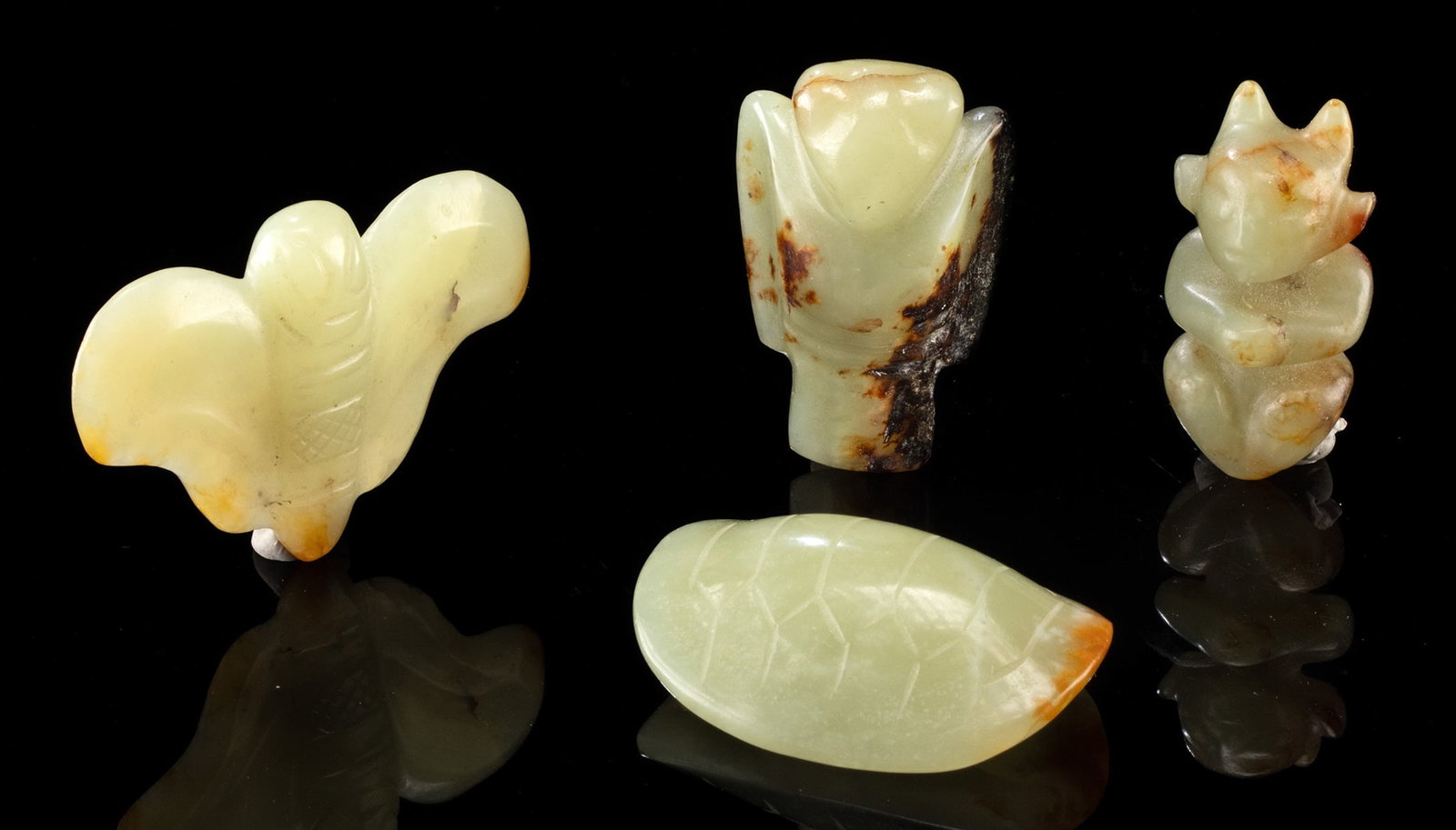 Four 19th C. Chinese Qing Jade Amulets (1 of 2)