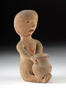 Tesuque Pueblo Pottery Seated Rain God Holding Jar