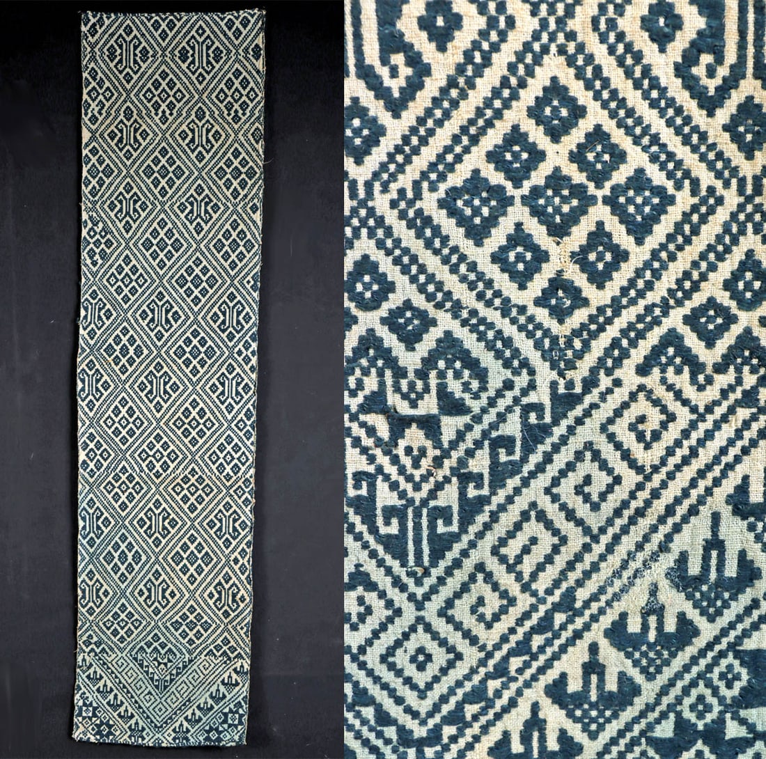 Early Thai / Laotian Khit-Woven Indigo Cotton Panel: Southeast Asia, Thailand / Laos ca. early-20th century CE. A hand-woven textile made from cotton fibers with indigo-dyed brocading to create a mesmerizing geometric design woven in one lengthy panel u