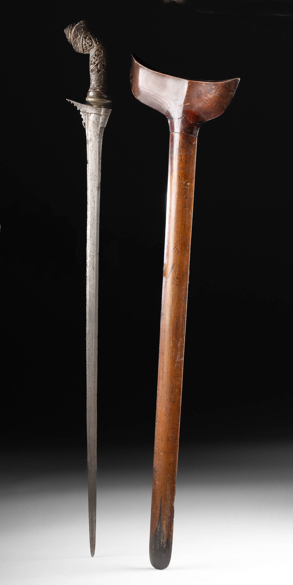 19th C. Indonesian Executioner Kris Sword Horn Handle: Southeast Asia, Indonesia, ca. 19th to early 20th century CE. A forged-steel executioner-style kris with a long, straight blade and a wooden sheath. This blade is significantly longer than typical kri