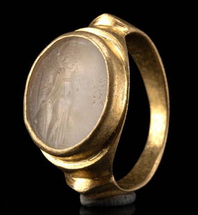 Roman Agate Intaglio of Minerva in Gold Ring: Roman, Imperial period, ca. 1st to 3rd century CE; Europe, Neoclassical period, ca. 19th century CE. Cradled in a Neoclassical gold setting, this ring features a Roman agate intaglio of luminous white