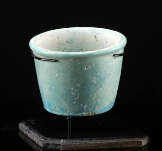 Egyptian Late Period Faience Offering Vessel (Ritual Use): Ancient Egypt, Late Period, ca. 664 to 332 BCE. A petite offering cup mold-formed from vibrant turquoise-hued faience, a material prized in ancient Egypt for its bright color and symbolic connection t