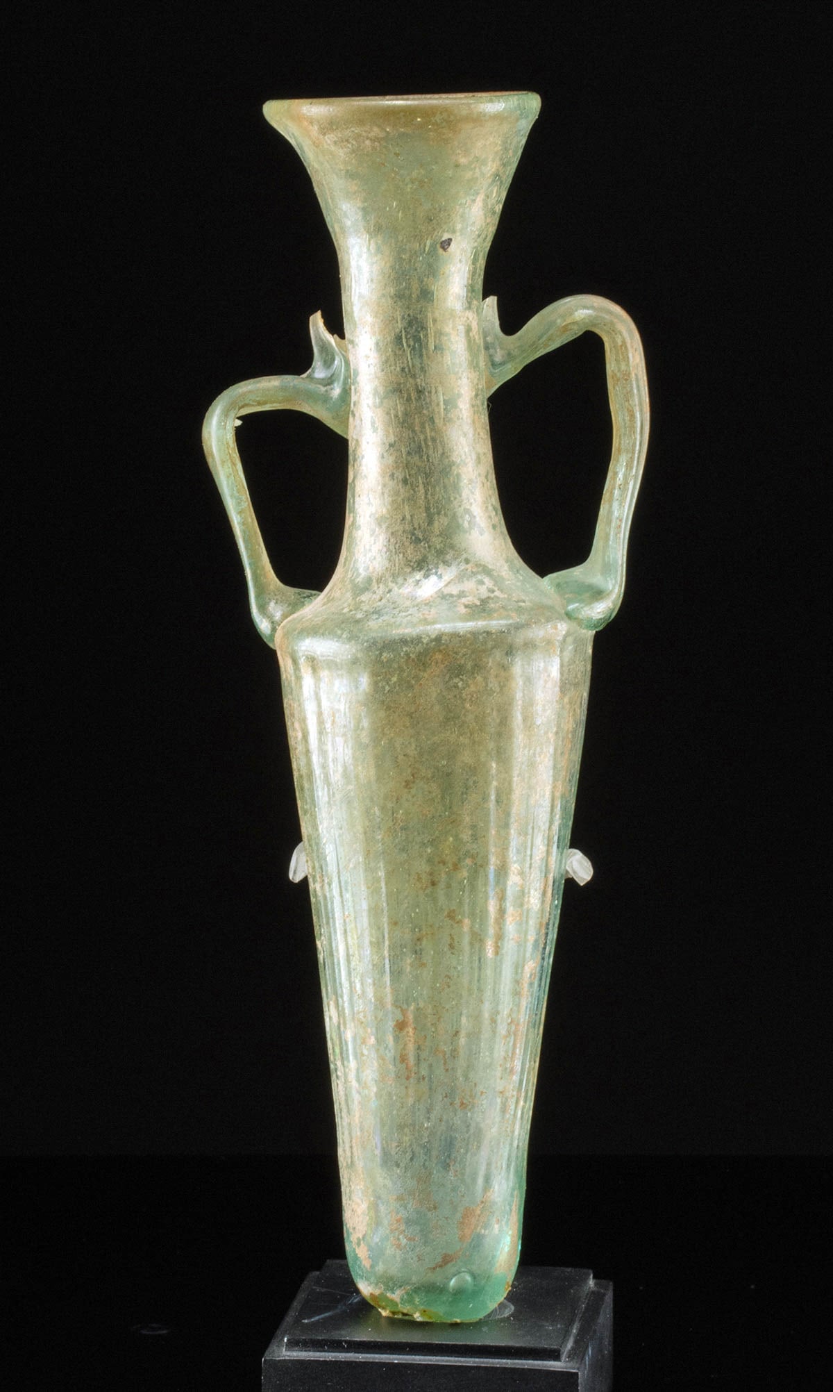 Choice / Intact Roman Glass Amphoriskos: Roman, Imperial Period, ca. 2nd to 4th century CE. A hand-blown amphoriskos probably using a striated mold for the lower half of the vessel and using hand-forming upper half. Vessel comprised of trans