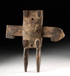 20th C. African Mali Dogon Wood Granary Door Lock: West Africa, Mali and Burkina Faso, Dogon people, ca. 20th century CE. A hand-carved wooden granary door lock in the form of an abstract zoomorph, perhaps a frog, and incised with decorative linear mo