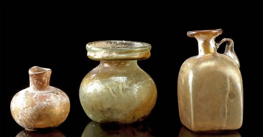 Three Roman Amber Colored Glass Vessels