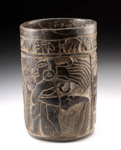 Maya Blackware Cylinder Vessel, Carved Glyphs & Figures: Pre-Columbian, Maya territories, Late Classic period, ca. 650 to 950 CE. A wonderful blackware cylinder vessel from the Late Classic Maya period, skillfully carved with intricate decorative and narrat