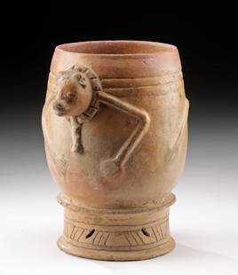 Maya Toltec Pottery Zoomorphic Effigy Rattle Cylinder: Pre-Columbian, Mexico, late Maya to early Toltec, ca. 1000 CE. Interesting pottery cylinder of barrel form sitting on spooled, decorated base in which original rattling pebbles were placed. Vessel was