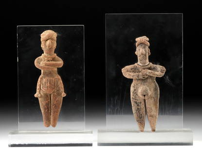 Two Tall Colima Pottery Standing Figures: Pre-Columbian, West Mexico, Colima, ca. 300 BCE to 300 CE. A lovely ensemble of 2 tall pottery figures from Colima culture, all shown standing with arms to their bare chests while wearing loincloths,