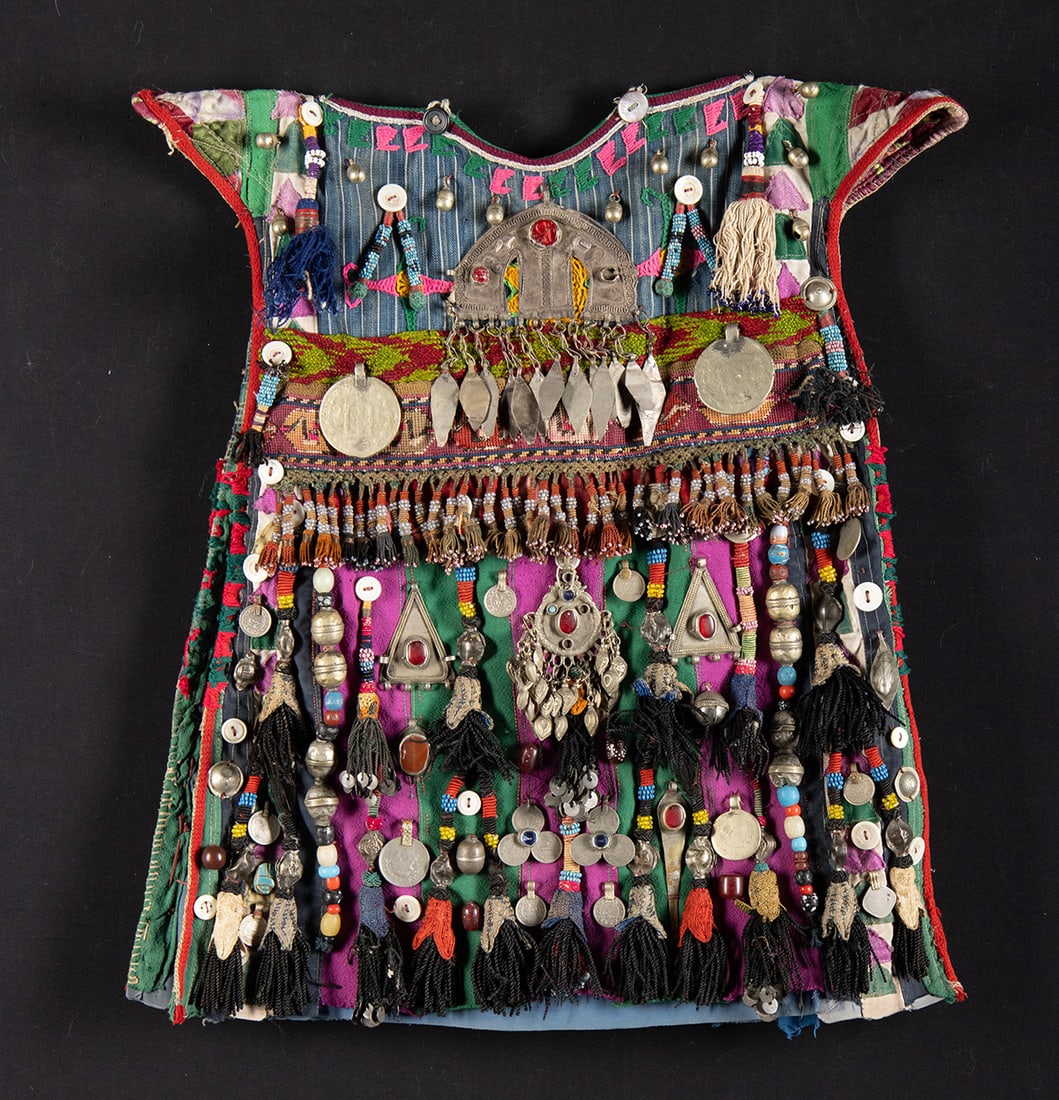 Turkmen Child's Cotton Tunic w/ Brass & Glass Ornaments: **Originally Listed At $200** Central Asia, Turkmenistan / Afghanistan, Turkmen (Turkoman) culture, ca. mid to late 20th century CE. A child's tunic made from cotton panels patched together with exten
