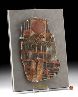 Early Egyptian Cartonnage, Falcon-Head Horus, ex-Baidun: Ancient Egyptian, Third Intermediate Period, likely from the 22nd or 23rd Dynasty, ca. 8th century BCE. This vividly painted wooden sarcophagus fragment features a representation of Horus in his