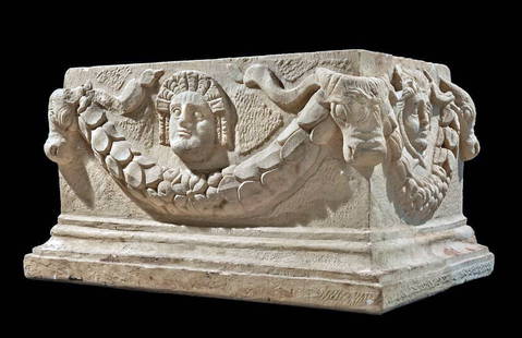Roman Marble Sarcophagus Masks & Bulls (Bucrania): Imperial Roman Period, ca. 1st to 2nd century CE. An exceptional Roman marble sarcophagus, carved in high relief on three sides with finely detailed garland swags, theatrical masks, and bucrania (ox s