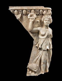 Roman Marble Caryatid Support Depicting Nike: Imperial Roman Period, ca. 1st to 3rd century CE An exceptional fragment of a marble architectural support, intricately carved in high relief with a depiction of Nike, the winged goddess and personifi