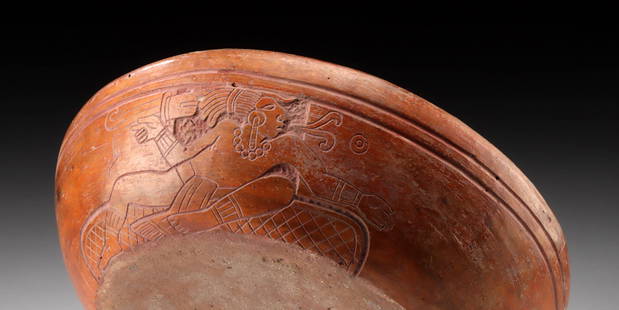 Rare Maya Carved Pottery Bowl - Hero Twins: Pre-Columbian, Mayan Territories, lowlands, Campeche or Peten, ca. 600 to 900 CE. This finely incised redware bowl presents an exceptionally well-executed narrative scene featuring both of the Hero Tw