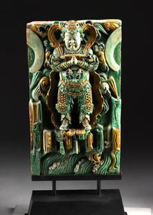 15th C. Ming Sancai Tile of Warrior Deity Wei Tuo: East Asia, China, Ming Dynasty, ca. 15th to 17th century. A finely molded and glazed pottery roof tile depicting Wei Tuo (Skanda), the Buddhist guardian deity, often shown as a youthful warrior. Rende